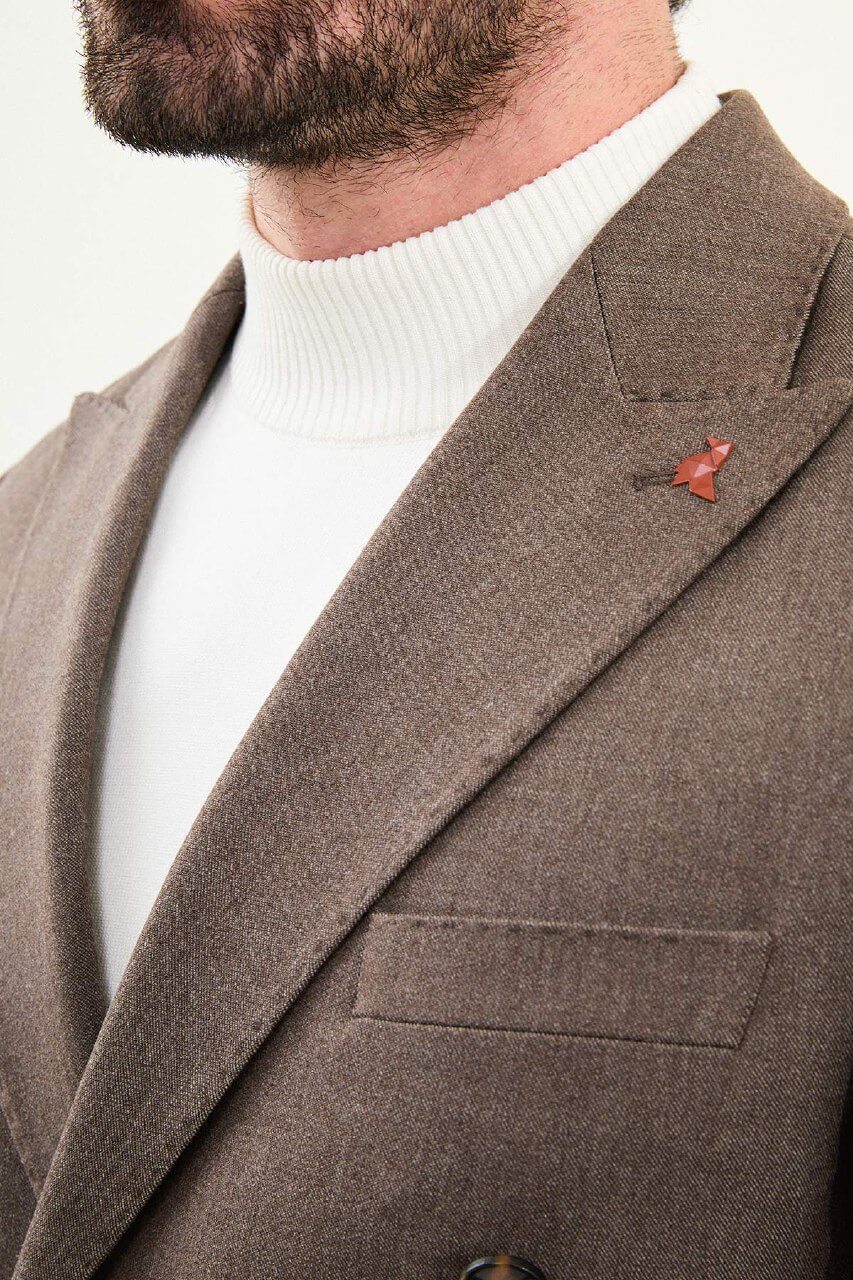 Men’s coffee brown mélange slim-fit double-breasted wool-blend suit with peak lapels, tortoiseshell buttons, and red origami lapel pin.