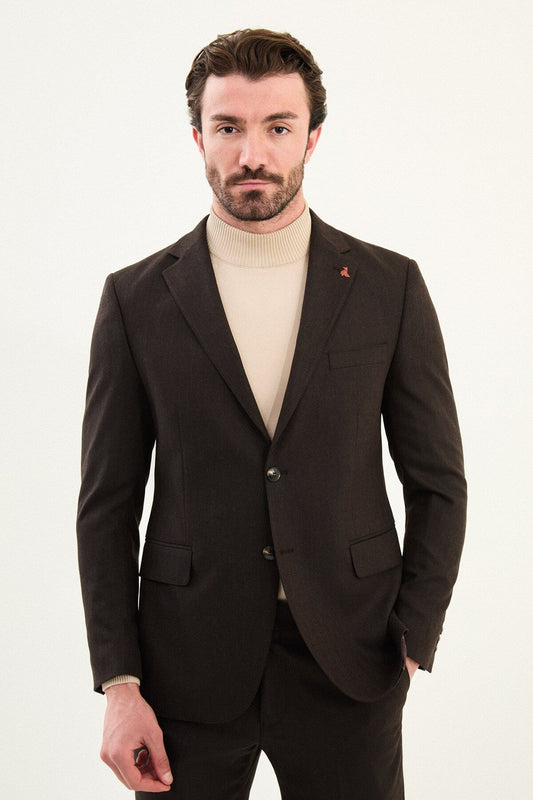 Men’s deep brown slim-fit single-breasted wool-blend suit with notch lapels and matte finish, high-wool fabric with stretch for winter wear, styled with a cream turtleneck for tonal dressing.