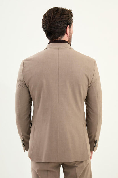 Men’s light brown sandstone slim-fit double-breasted 6x2 suit with peak lapels, cotton-wool-viscose blend with 4-way stretch for wrinkle-resistant wear, styled with a tonal brown turtleneck.